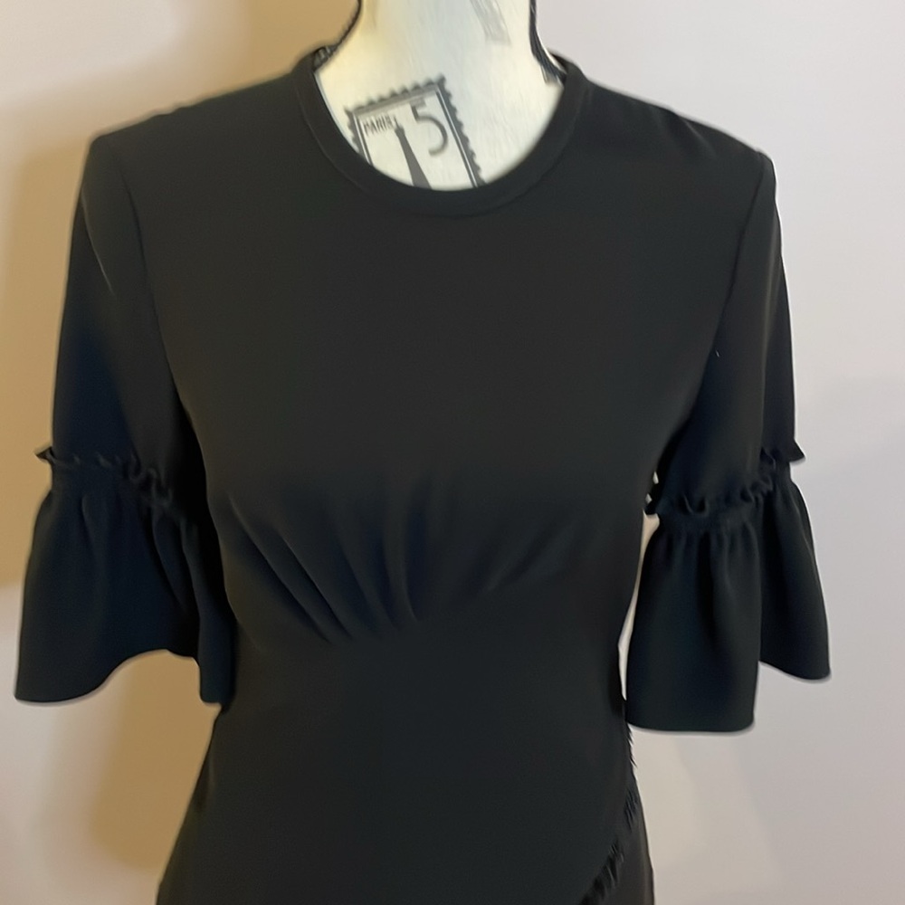 ✨ Yigal Azrouël Black Asymmetrical Peplum Top – NWT - Picture 6 of 8